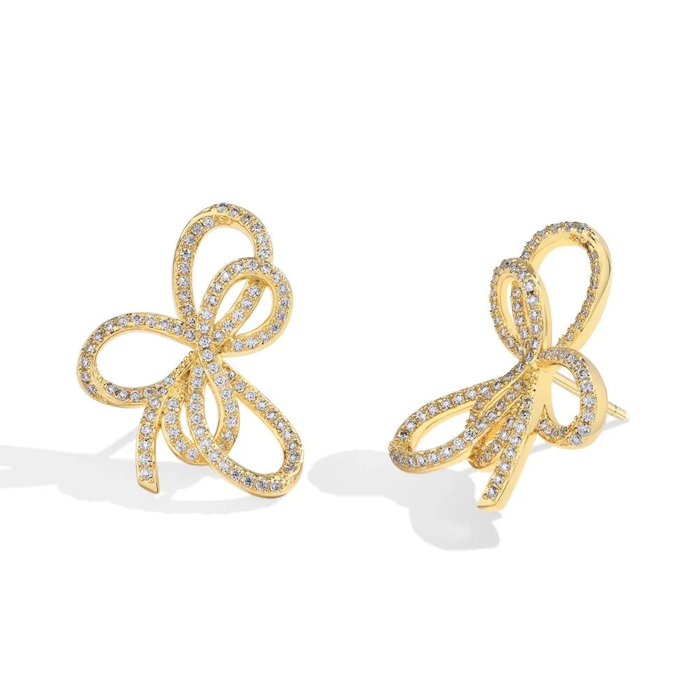 Open Bow Moissanite Stud Earrings in 925 Sterling Silver