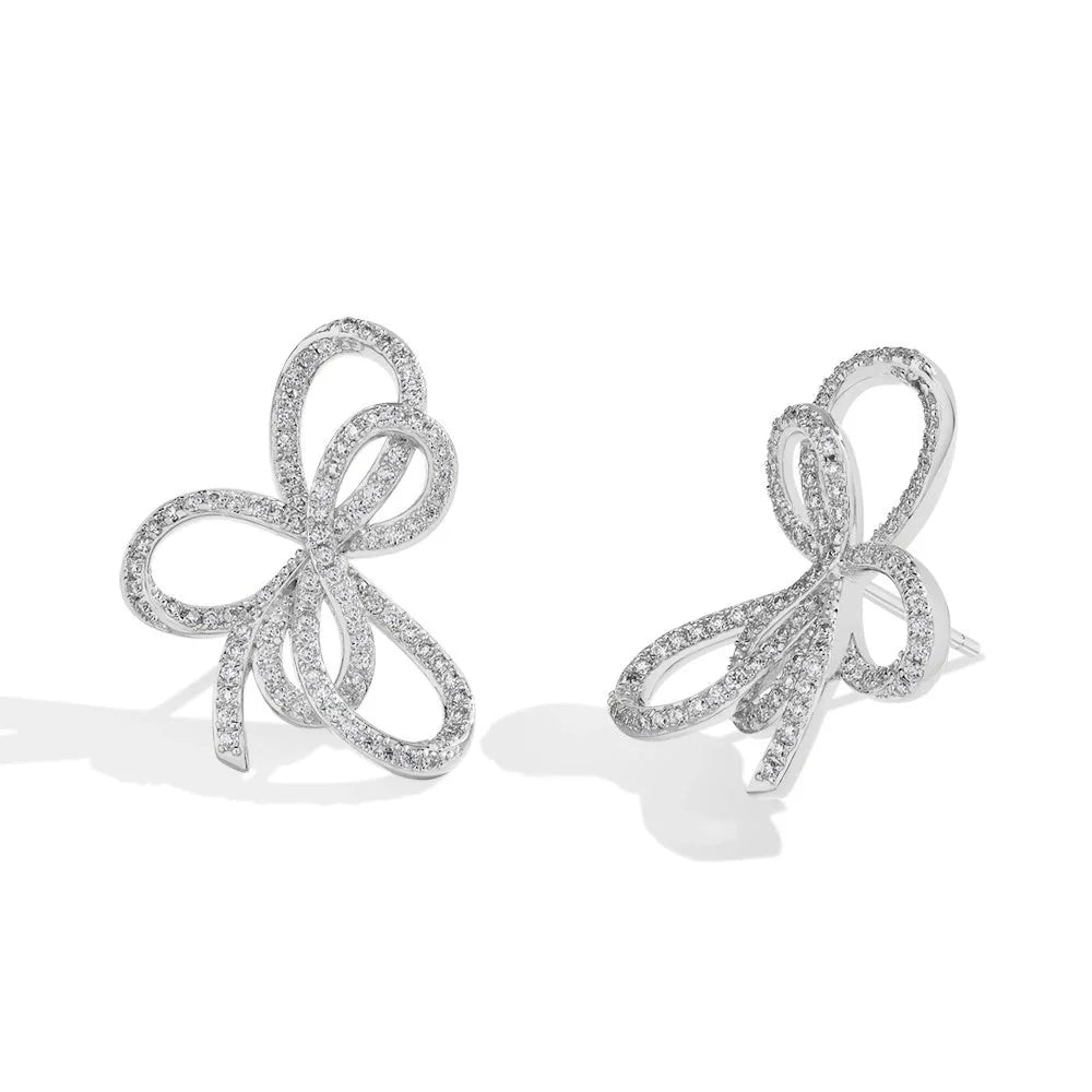 Open Bow Moissanite Stud Earrings in 925 Sterling Silver