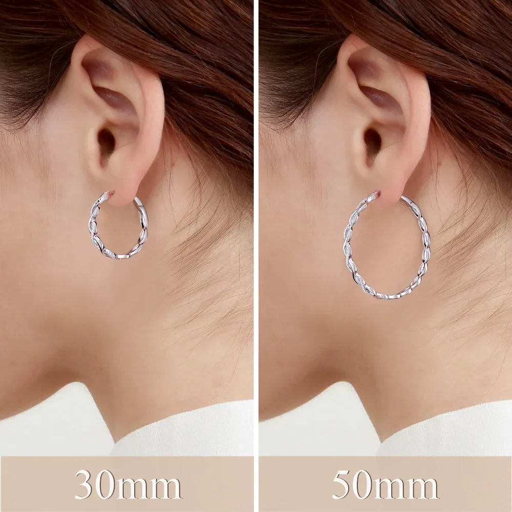 Twisted Infinity Moissanite Hoop Earrings in Sterling Silver