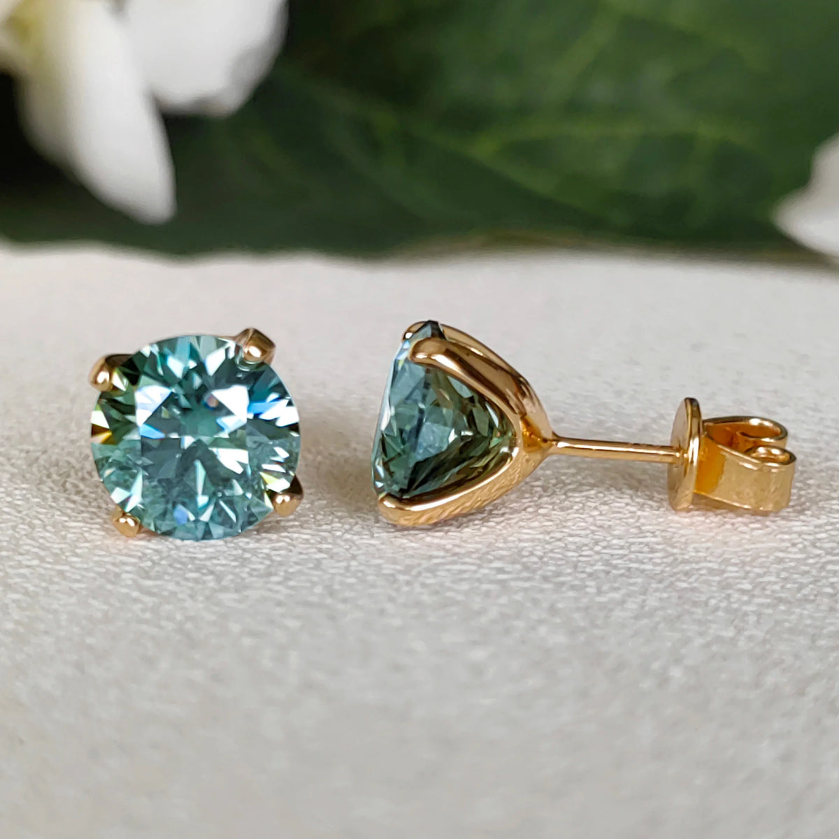 Cyan Round Moissanite Stud Earrings in Sterling Silver