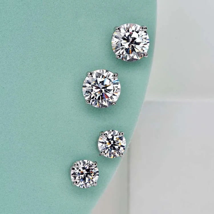Four-Prong Round Moissanite Stud Earrings in Gold-Tone or Silver