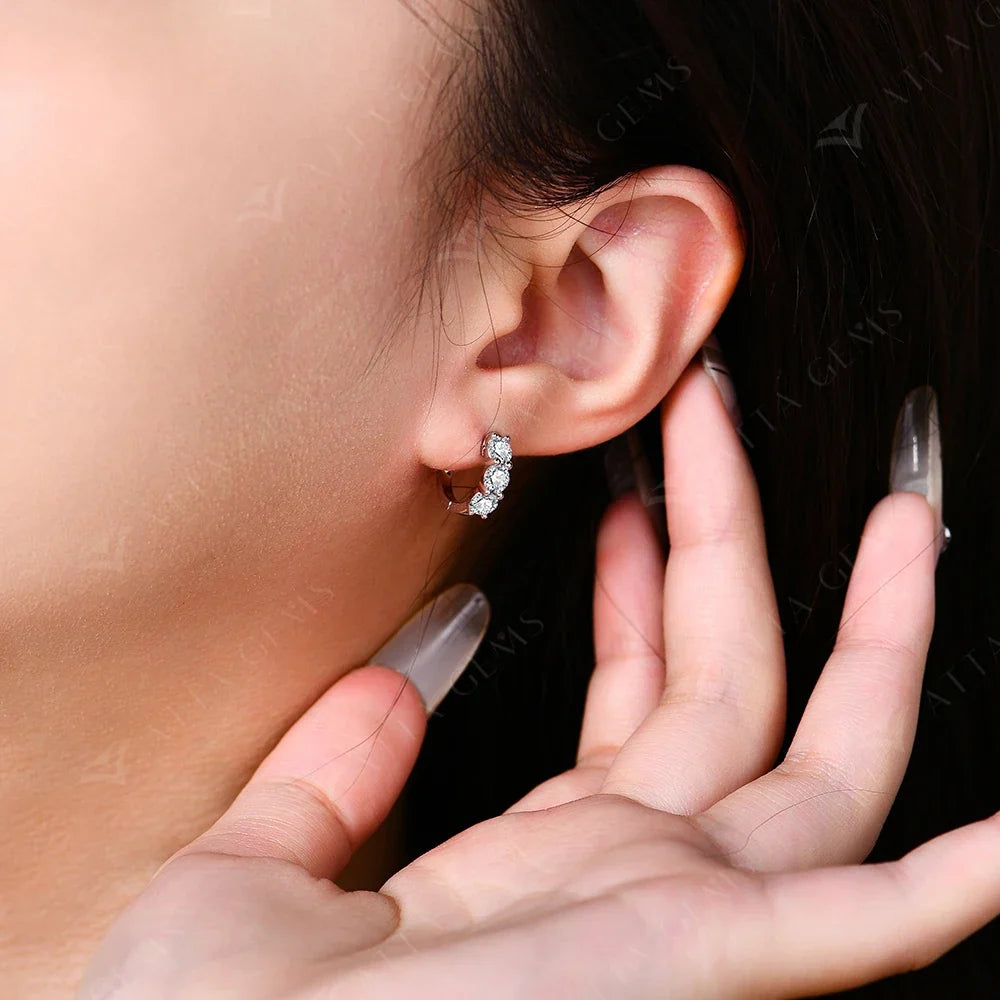 Graduated Three-Stone Moissanite Hoop Earrings in Sterling Silver