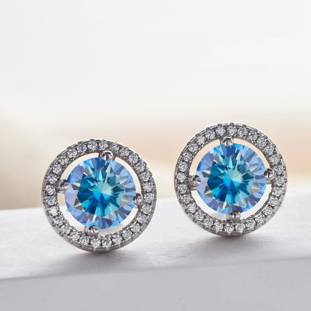 Blue Moissanite Halo Stud Earrings in Sterling Silver