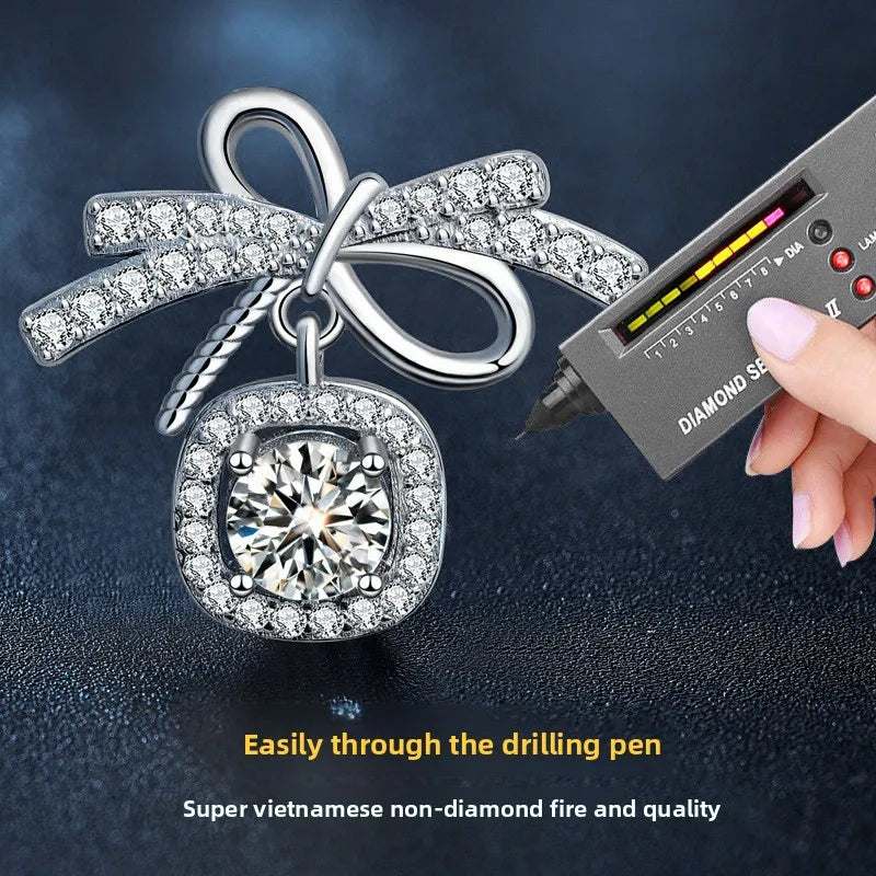 Moissanite Bow Stud and Drop Earrings in Sterling Silver