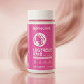 Shiny, healthy-looking hair styled with UpNourish LUSTROUS HAIR serum showcasing smooth, glossy locks.