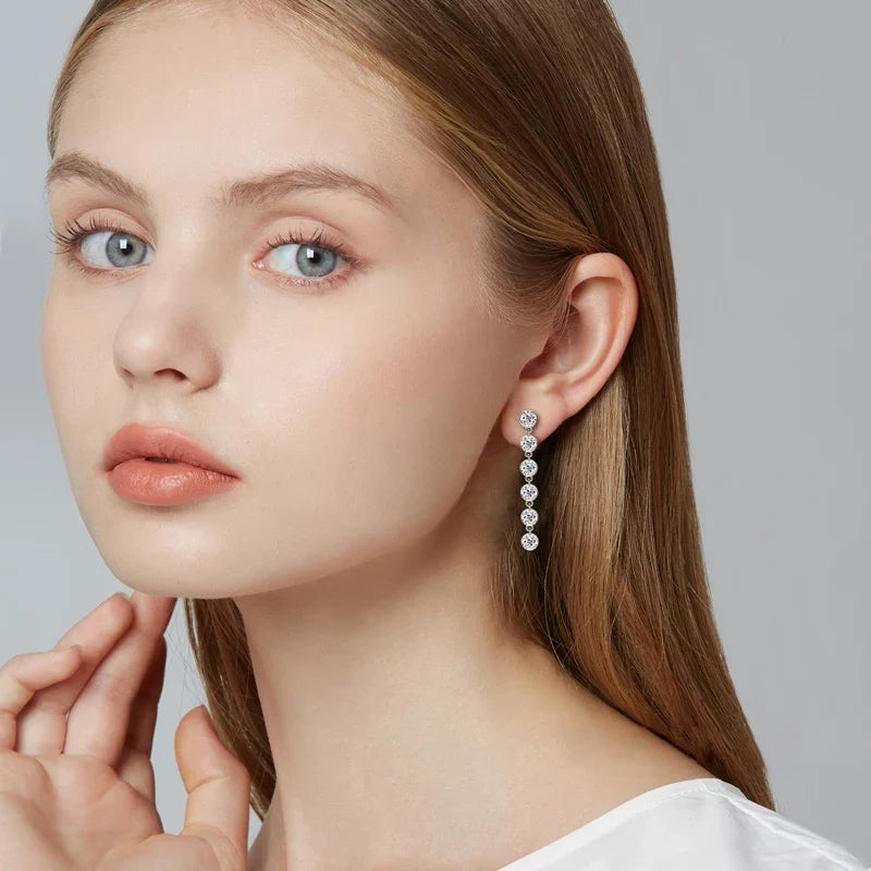 Six-Stone Moissanite Line Drop Earrings in Sterling Silver