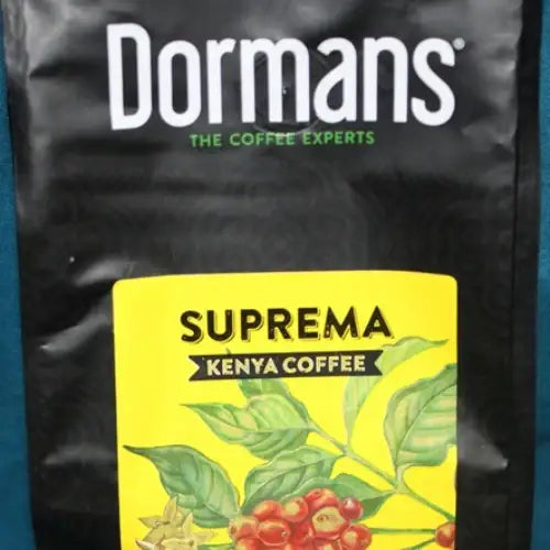 Dormans SUPREMA Kenya Coffee - Medium Roast Medium Grind 375g - World Safari Shops. Premium Kenyan medium roast ground coffee 375g from Dormans Suprema, featuring medium grind coffee with citrus notes, subtle chocolate undertones, sweet maple aromatics, smooth body, and clean finish.