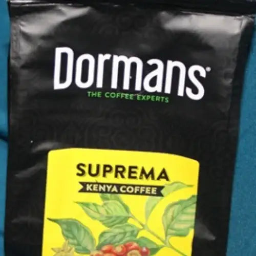 Dormans SUPREMA Kenya Coffee - Medium Roast Medium Grind 375g - World Safari Shops. Medium roast coffee for pour-over brewing from Dormans Suprema, made with Kenyan coffee beans and a medium grind that brings out bright citrus notes, subtle chocolate, and sweet maple aromatics.